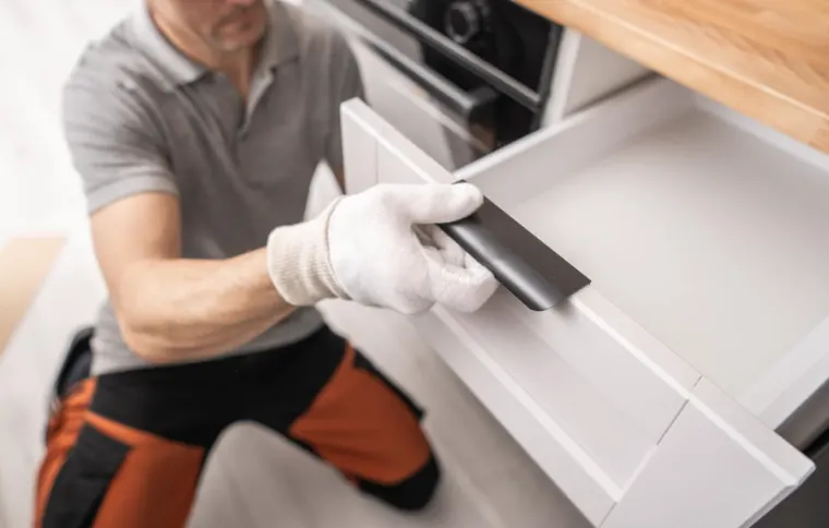 Cabinet installation during a home renovation