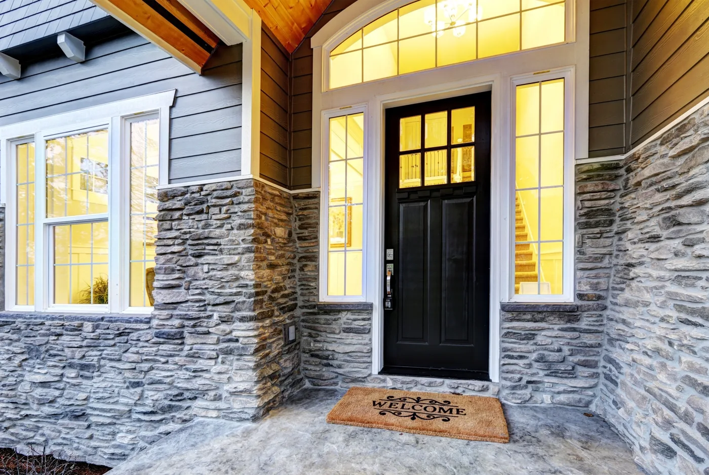Stone and timber entry on a custom home in Indiana