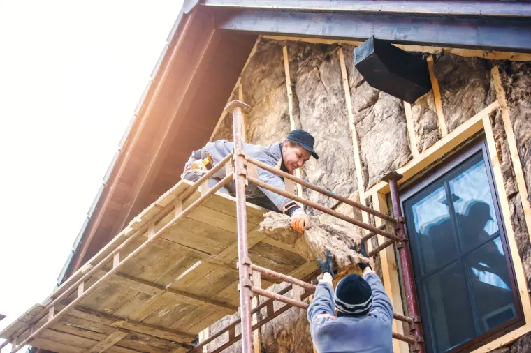 Crew framing a home addition in Southwest Indiana